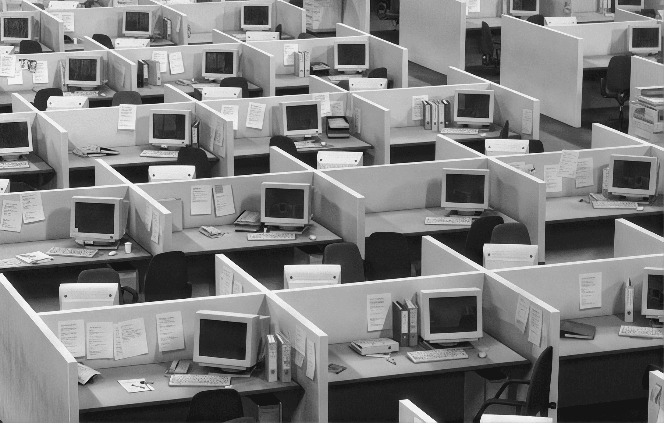 Rows of empty office cubicles