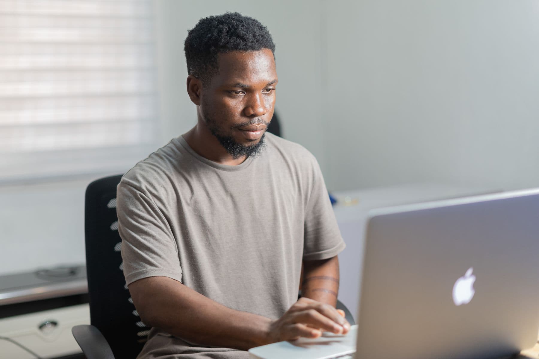 A focused builder working at a desk